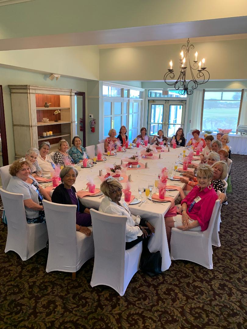 The ladies are seated and ready for lunch.  Buffet line and cake await. 